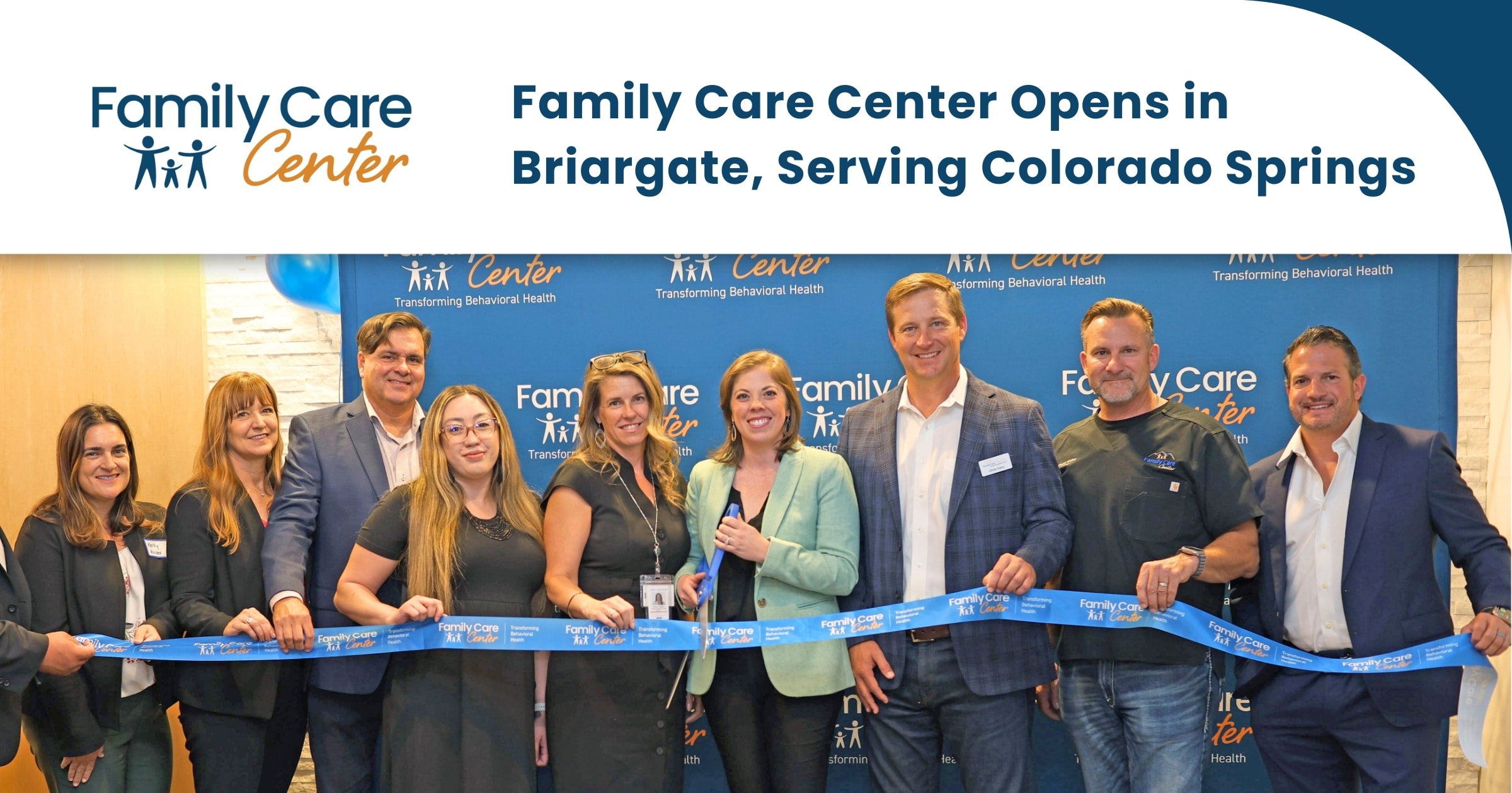 The Family Care Center team cuts a ribbon at the Briargate clinic opening.