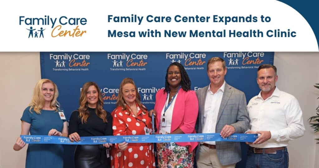 The Family Care Center Mesa clinic team celebrated its opening with a ribbon cutting. They are cutting a ribbon in this photo.