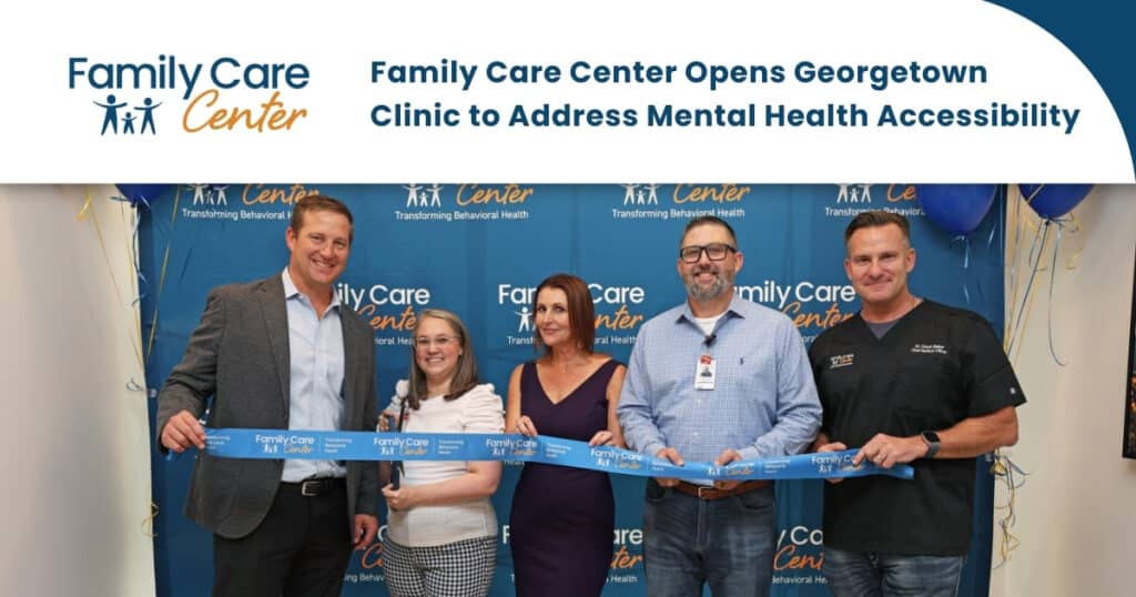 The Family Care Center Georgetown clinic team cuts a ribbon at their grand opening event.