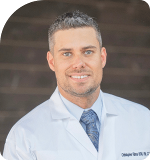 Headshot of Christopher Kinna standing at the Family Care Center Clinic in Stone Oak