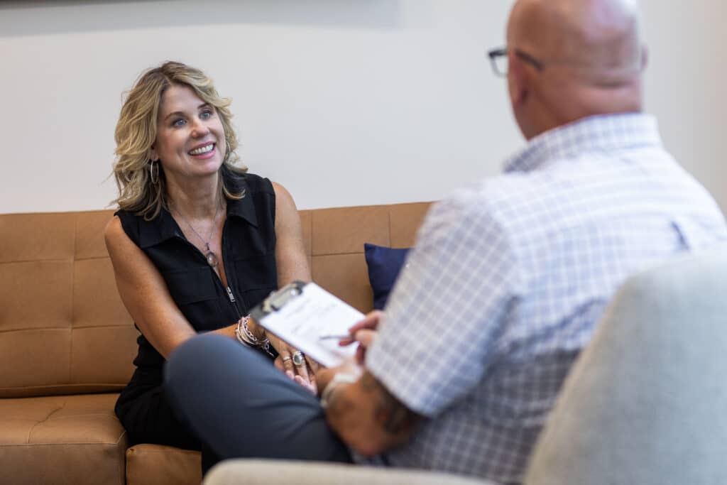 provider and patient talking during individual therapy session